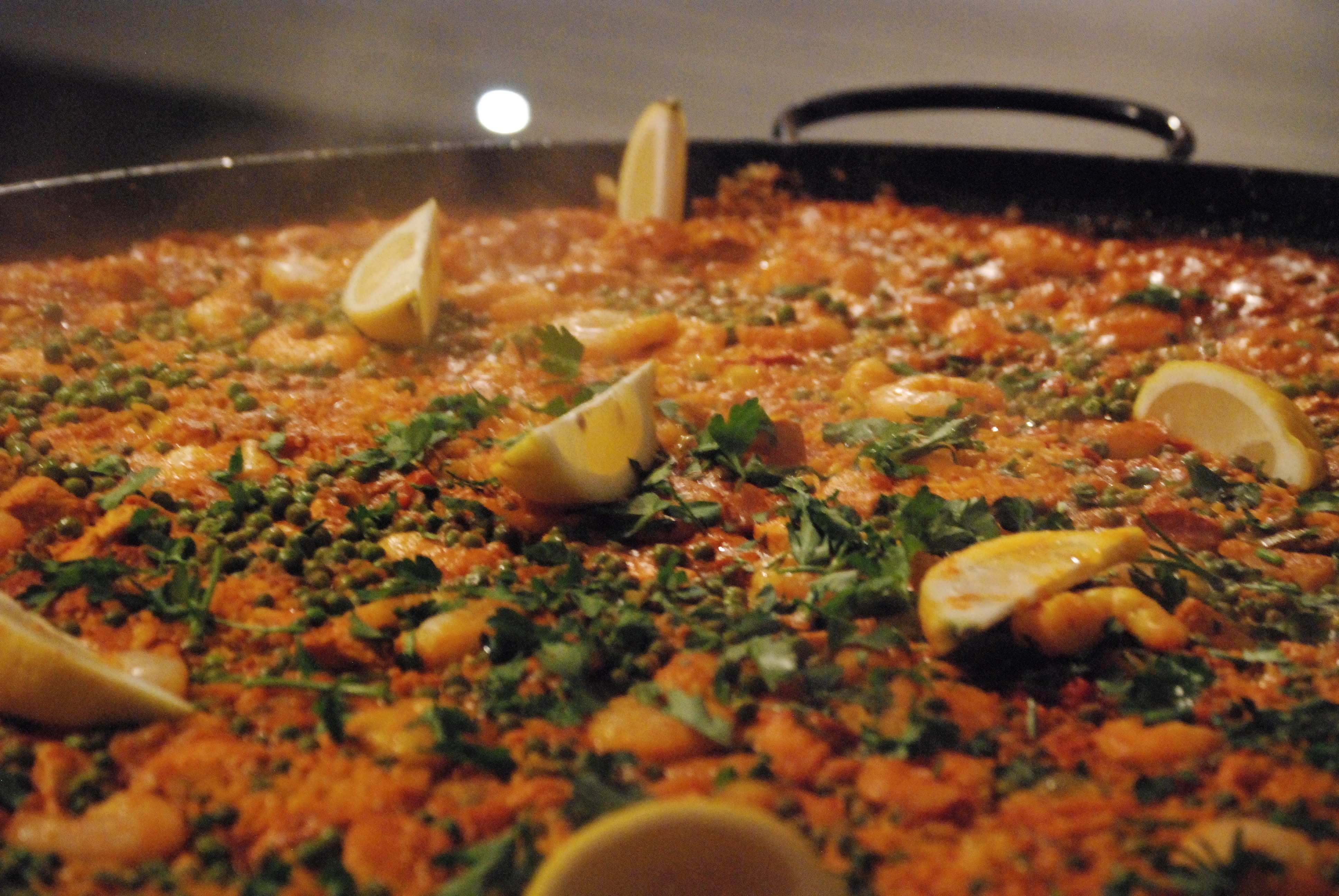 Big Pans People mixed paella with chicken, chorizo, jumbo king prawns, peas, herbs and lemon